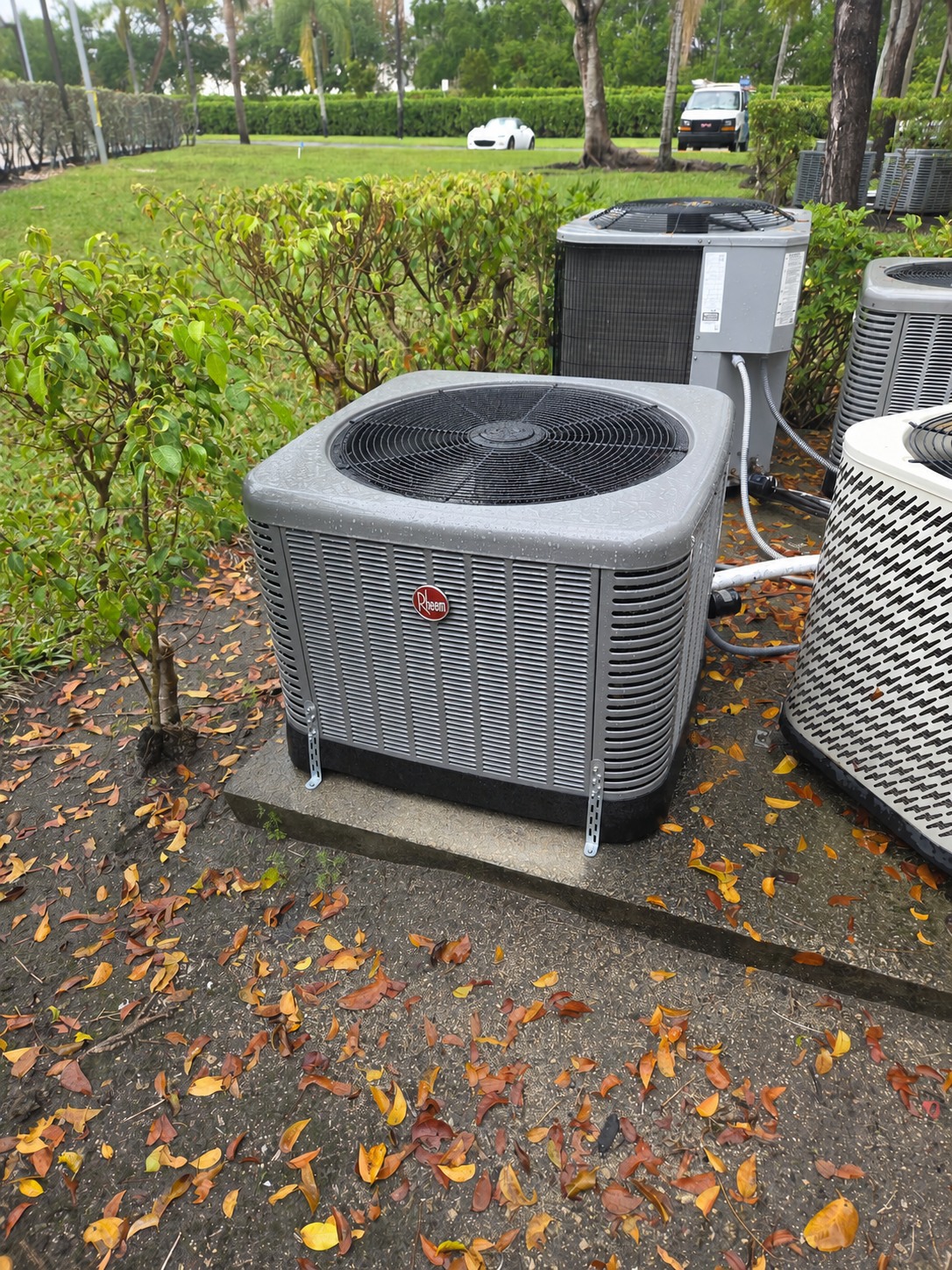 Clean Rheem air-conditioning condenser ready for service