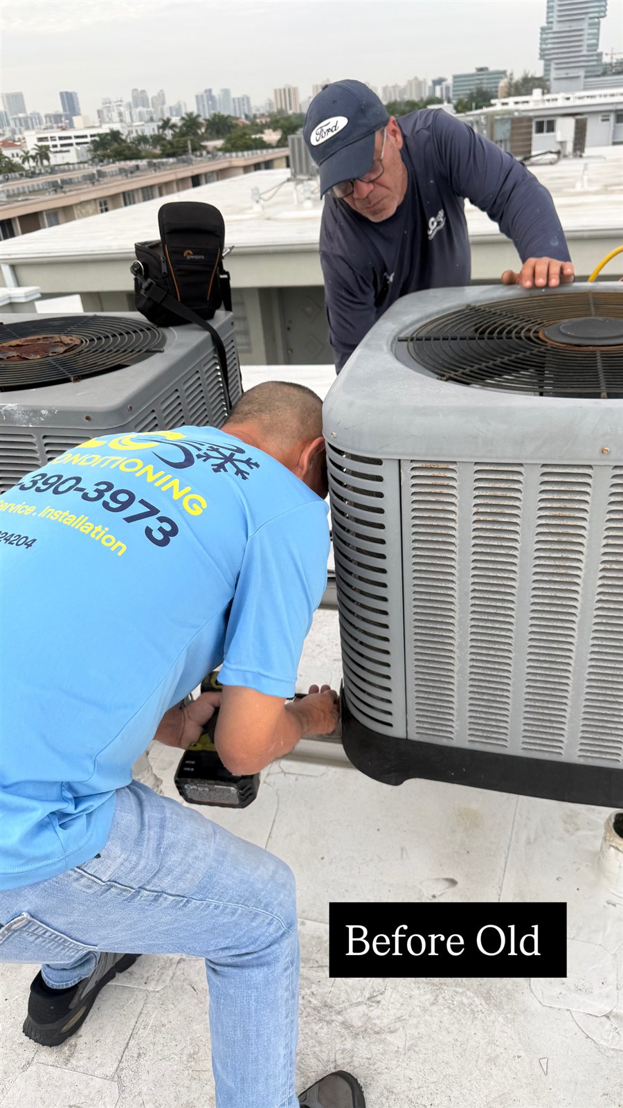 JLC technicians performing maintenance on rooftop condenser units