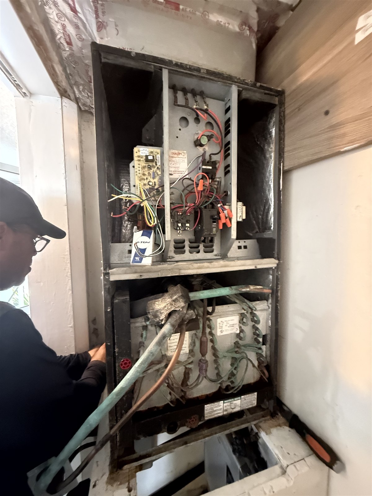 Open residential air handler during electrical service